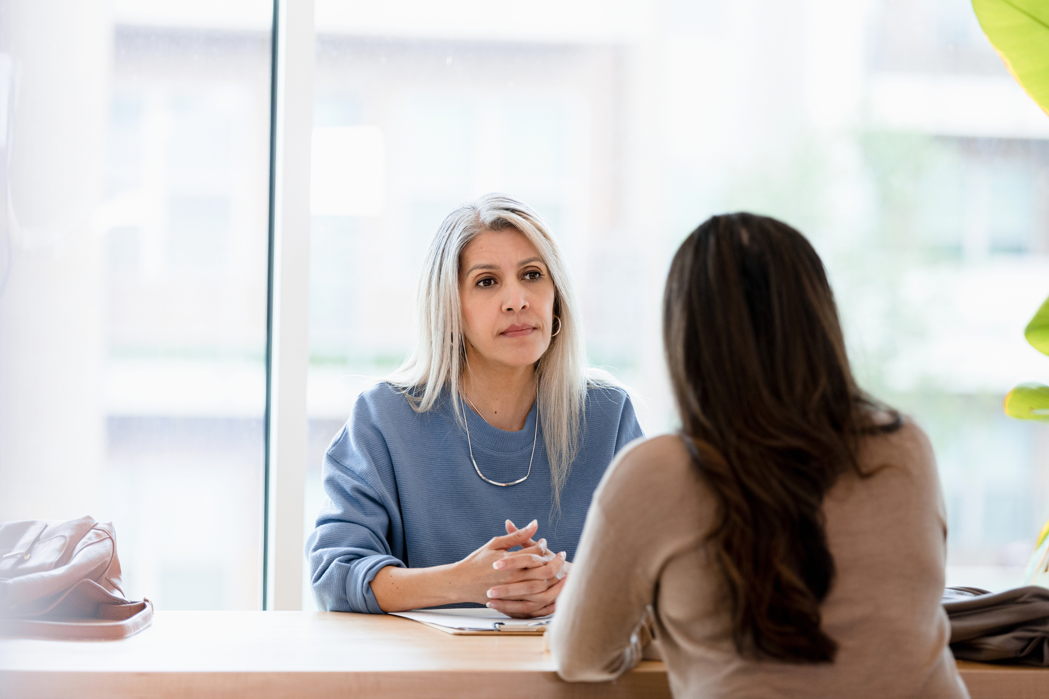 Serious meeting between two businesswomen